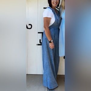 Adorable wide leg denim overalls with elastic fitting around waist sz. Medium